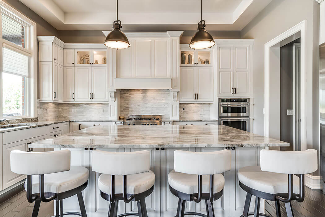White kitchen with large island