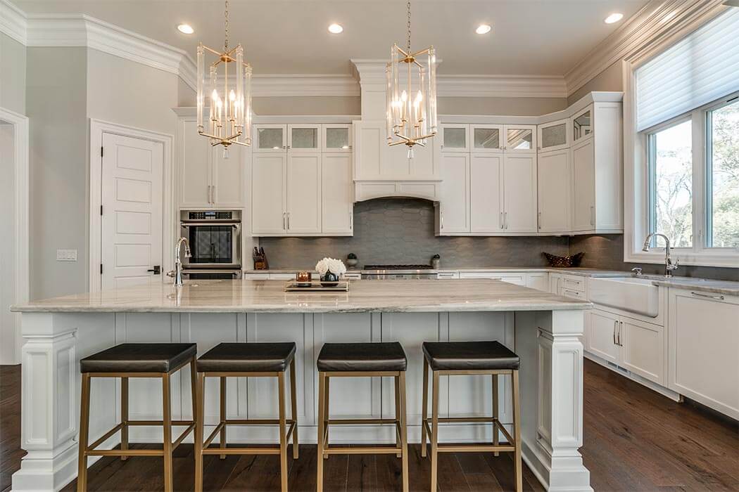 White kitchen with large island